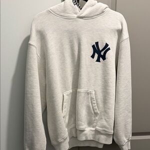 Madhappy Off-White Hoodie with Navy Emblem